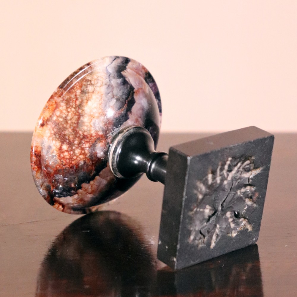 A small nineteenth-century tazza featuring a shallow turned Blue John bowl with purple and brown banding, set upon a black turned marble stem and square base. View III