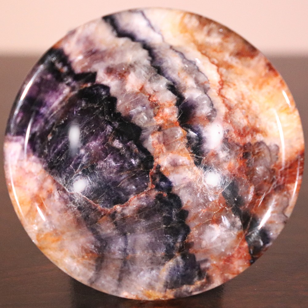 A small nineteenth-century tazza featuring a shallow turned Blue John bowl with purple and brown banding, set upon a black turned marble stem and square base. View V