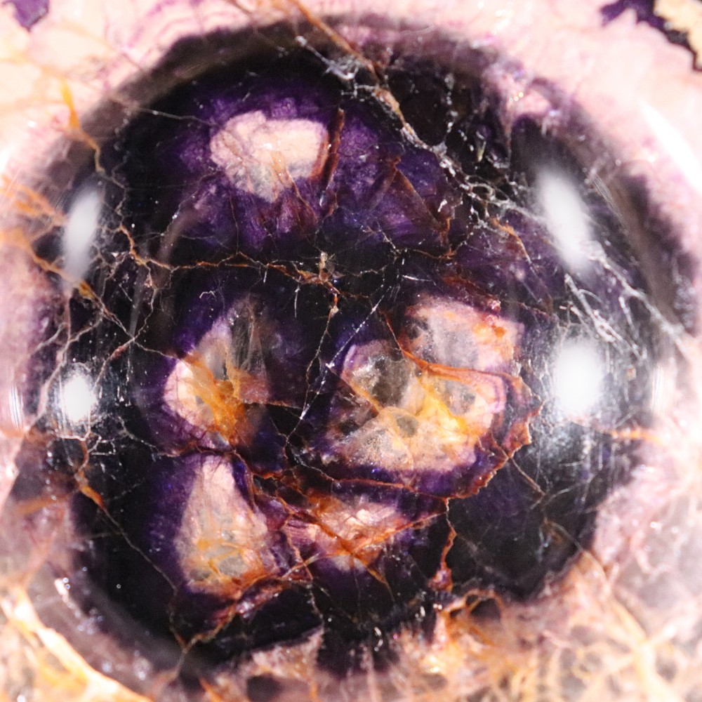 A small 19th-century Blue John fluorite tazza with purple and yellow banding, mounted on a turned stem and a square black marble base. View VI