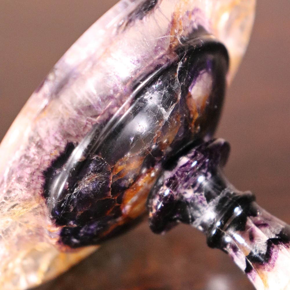 A small 19th-century Blue John fluorite tazza with purple and yellow banding, mounted on a turned stem and a square black marble base. View IX
