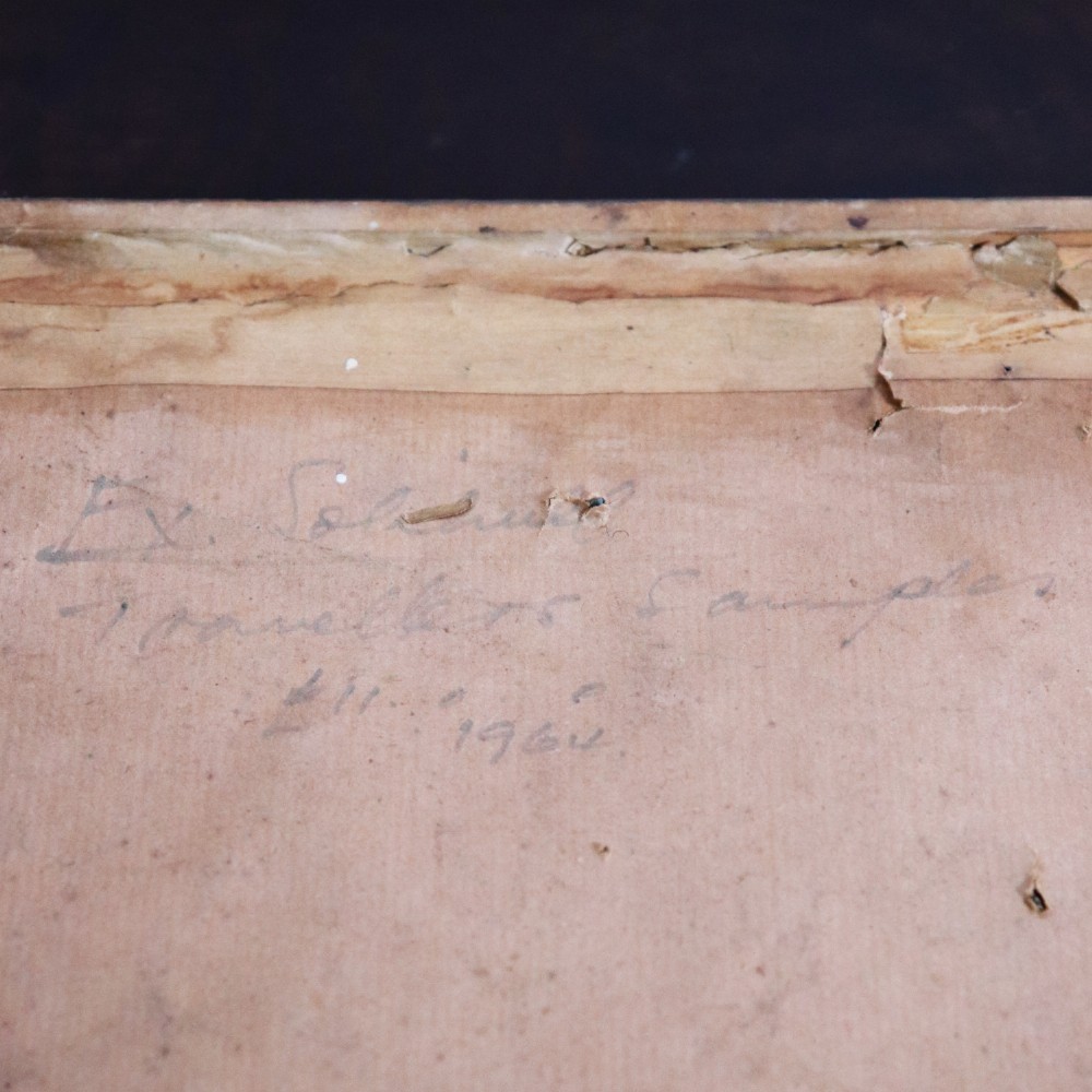 A framed commercial sample board containing antique brass and cast iron door hardware, latches, and ceramic handles mounted on annotated paper with a header reading Gerwin & Co., Birmingham. View VII