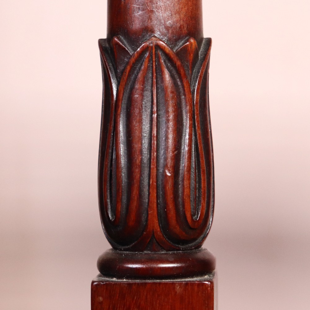 A set of six Regency period side chairs crafted from dark Goncalo Alves timber featuring carved crest rails, detailed backsplats, turned front legs, and hand-woven cane seats. View IV