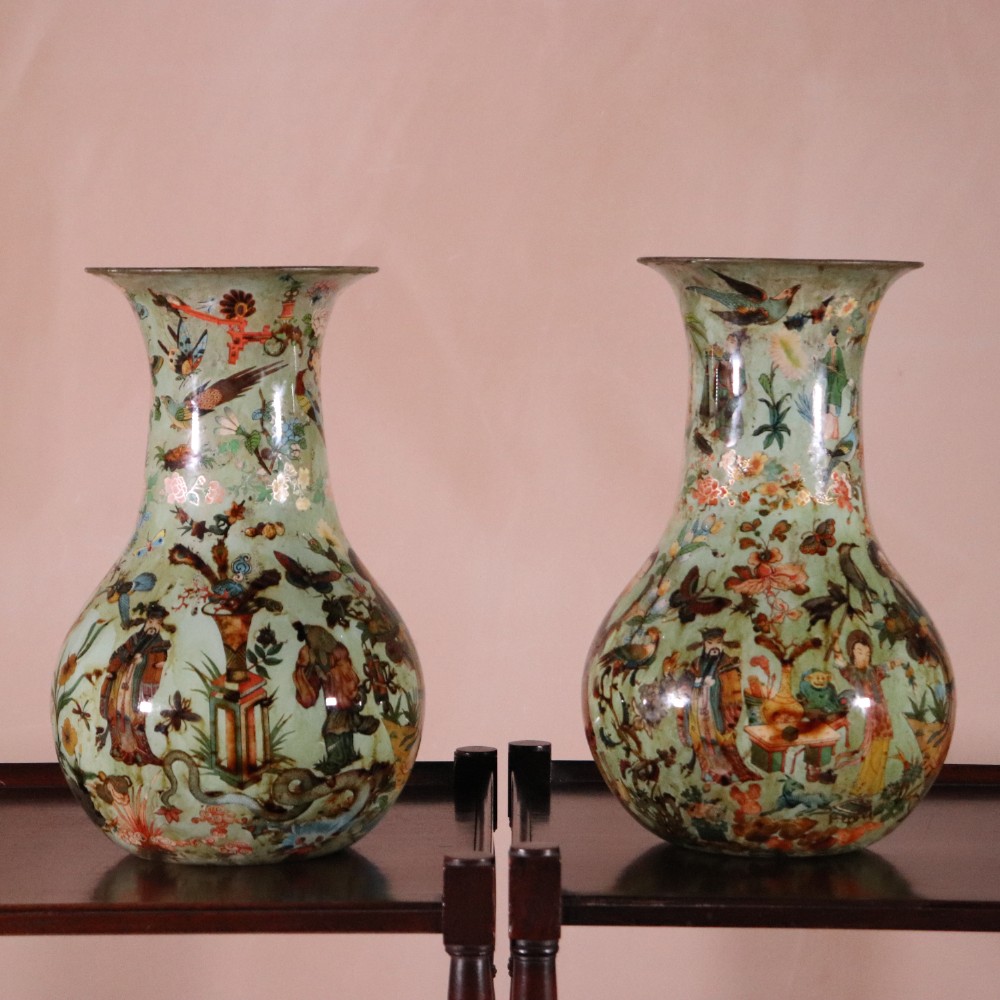 A pair of 19th-century pale green decalcomania glass baluster vases decorated with Chinoiserie figures, birds, and botanical motifs. View II
