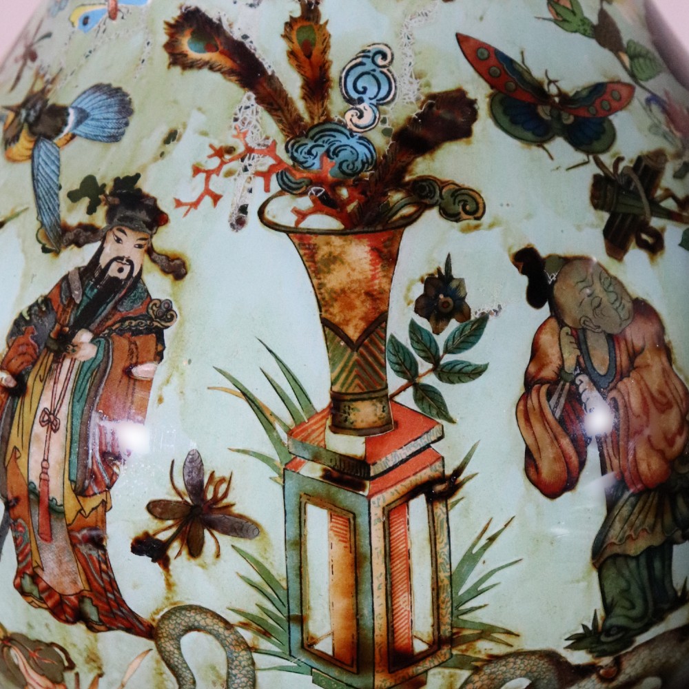 A pair of 19th-century pale green decalcomania glass baluster vases decorated with Chinoiserie figures, birds, and botanical motifs. View V