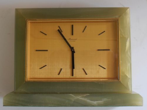 Art Deco Clock in Onyx Surround.