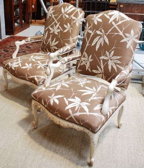A Pair of 19th Century Painted Continental Fauteuils