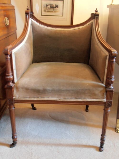 An Edwardian Mahogany Armchair