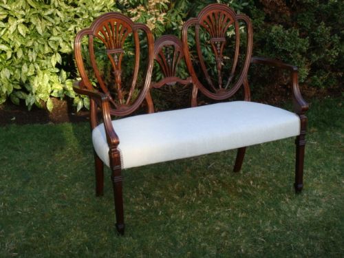 fig 1. An early 20th century Hepplewhite style mahogany double chair back settee