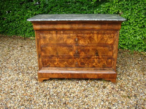 A 19th Century French Burr Walnut Commode