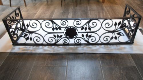 A Wrought Iron Pierced Fender