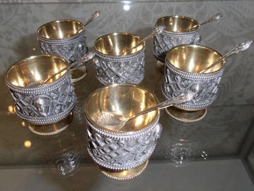 Six Egyptian Revival Brass and White Metal Salt Cellars
