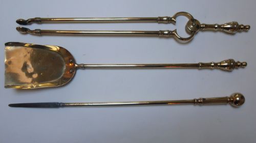 A Set of Brass Fire Irons