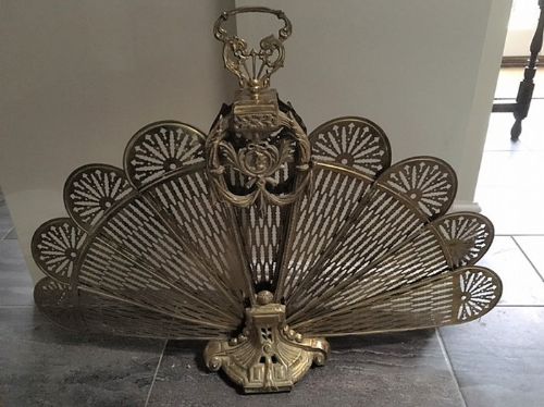 A Brass Fire Fan Guard