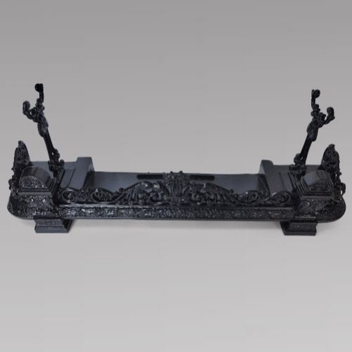 A Black Cast Iron Victorian Fender with Iron Stands C1880