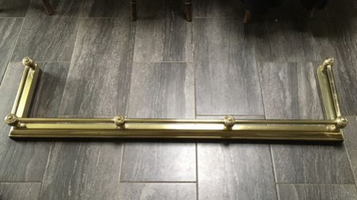 An Edwardian Brass and Steel Bottom Fender