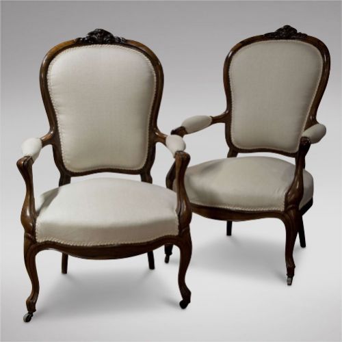 A Pair of French Walnut Fauteuils