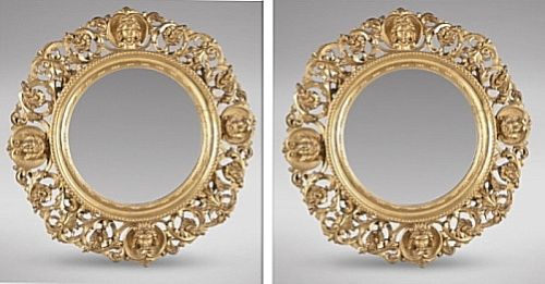 A Pair of Italian Carved Giltwood Circular Wall Mirrors