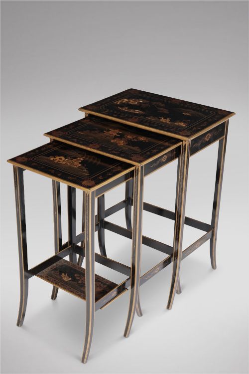 A Nest of Three Black Lacquered Tables