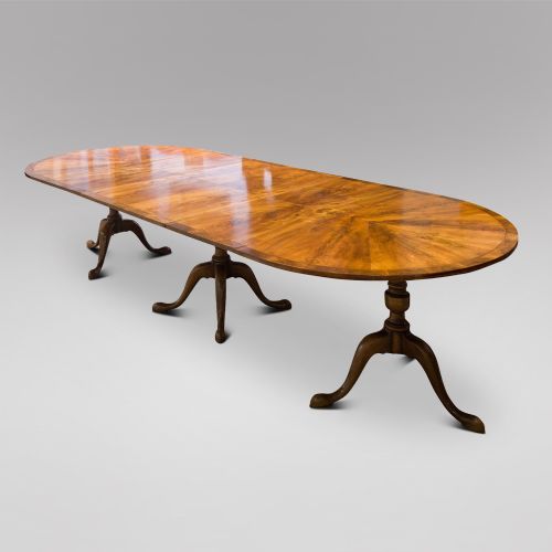 A C1900 Walnut Dining Table with Two Leaves and Three Pedestals