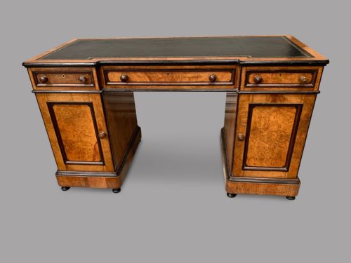 A Breakfront Kneehole Desk by Lamb of Manchester
