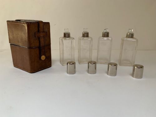 An Edwardian Four Bottle Leather Holder