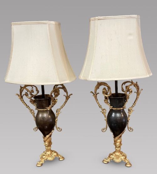 Pair of Patinated Gilt Metal Lamps by Bradley & Hubbard