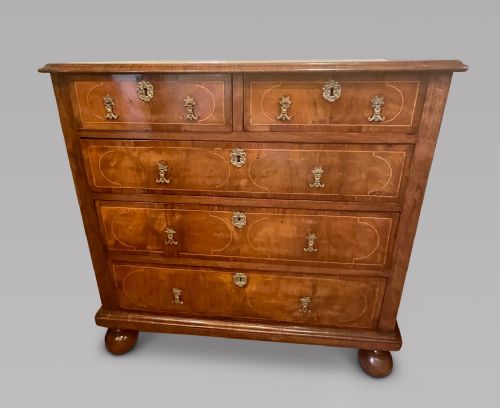 A Late 17th Century Walnut and Tracery Strung Chest of Drawers