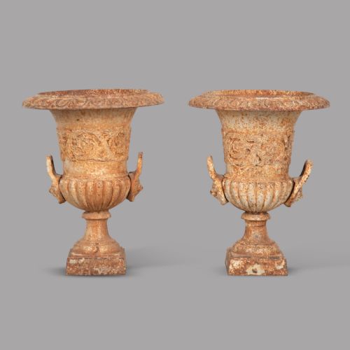 A Pair of Cast Iron Urns