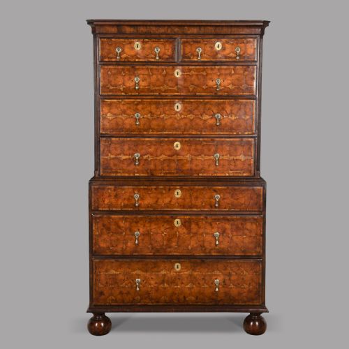 A Walnut and Yew Wood Oyster Chest on Chest