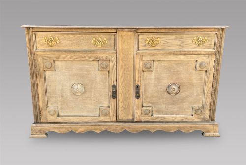 An Arts and Crafts Stripped Oak Dresser Base