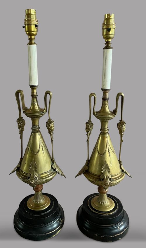 A Pair of French Decorative Brass Lamps