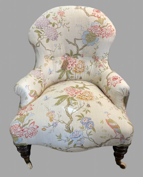 An Iron Framed Re Upholstered Nursing Chair