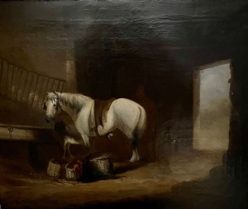 fig 1. An antique oil painting depicting a white horse inside a stable, framed in an ornate gilded wood frame.