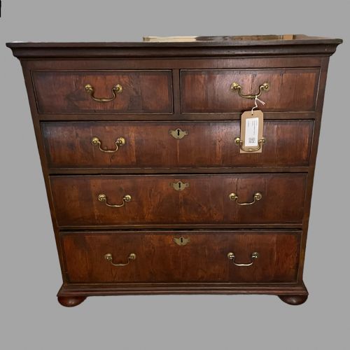 A Georgian Walnut Chest of Drawers