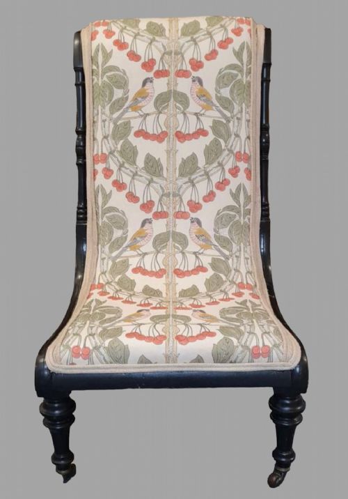 An Attractive Ebonised Victorian Chair