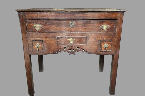 A Georgian Oak Lowboy