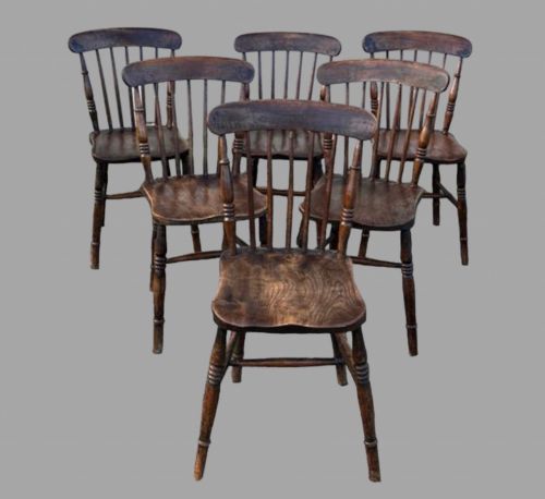 A Set of Late 19th Elm Seated Stickback Country Dining Chairs