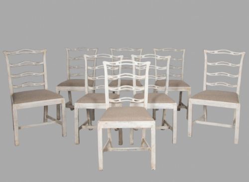 A Set of Eight Painted Ladderback Chairs (2 Carvers,6 Singles)