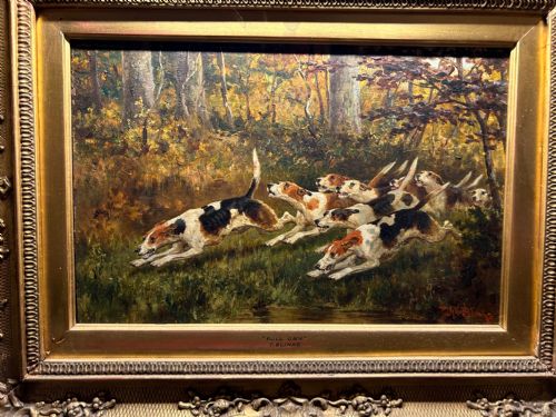 fig 1. A Victorian oil painting on board by Thomas Blinks depicting foxhounds running through a woodland landscape, set in a carved gilt frame.