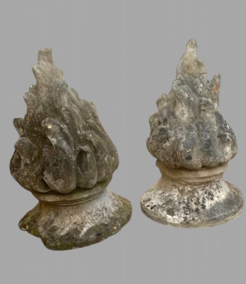 A Pair of Early Limestone Torches/finials