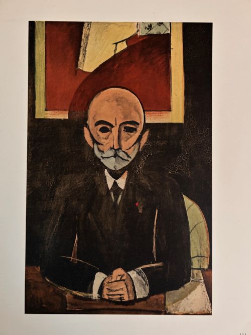fig 1. A colourful Fauvist art print depicting a seated young man wearing a blue sweater and green trousers against a pink background.