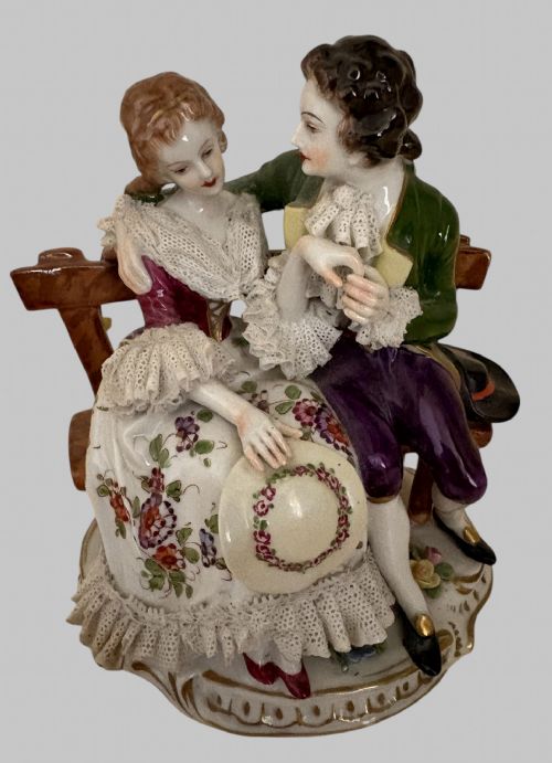 fig 1. A collection of six hand-painted German porcelain figurines depicting 18th-century courtly and pastoral figures in colourful period attire.