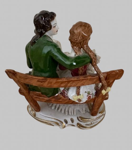 fig 2. A collection of six hand-painted German porcelain figurines depicting 18th-century courtly and pastoral figures in colourful period attire.