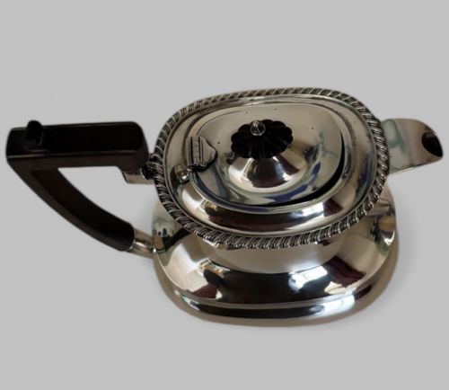fig 3. A Silver Teapot or Hot Water Pot Dated 1919