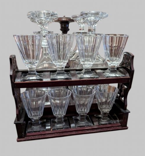 fig 5. An open 19th-century French Napoleon III wooden cave a liqueur box featuring inlaid lid detailing and a removable tier holding cut-glass decanters and small glasses.