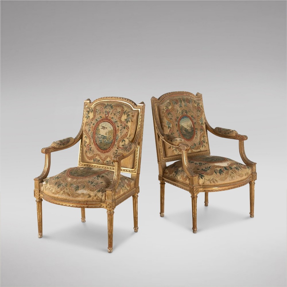 A Pair of French Louis XVI late 19th Century Armchairs