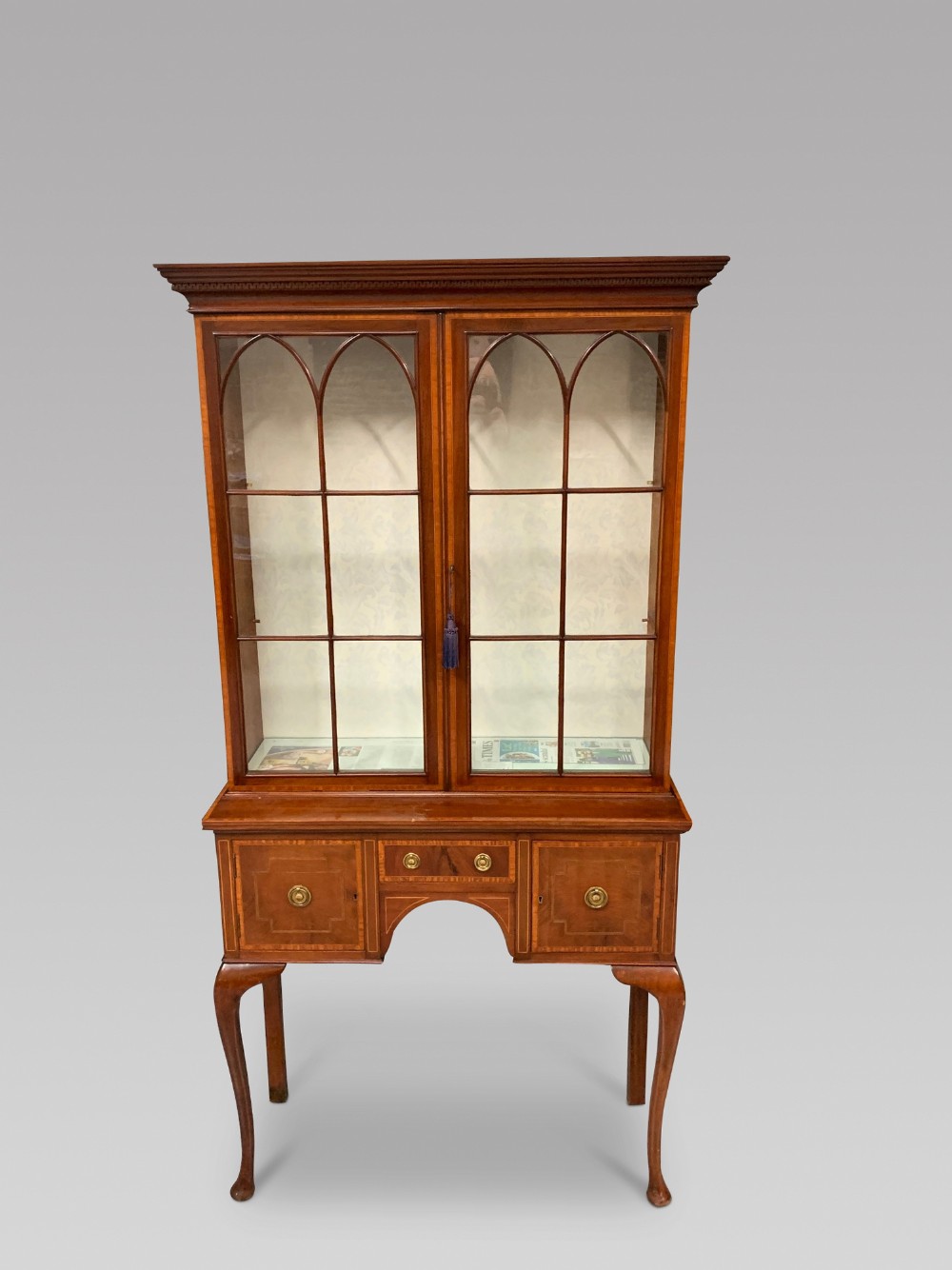 An Edwardian Display Cabinet