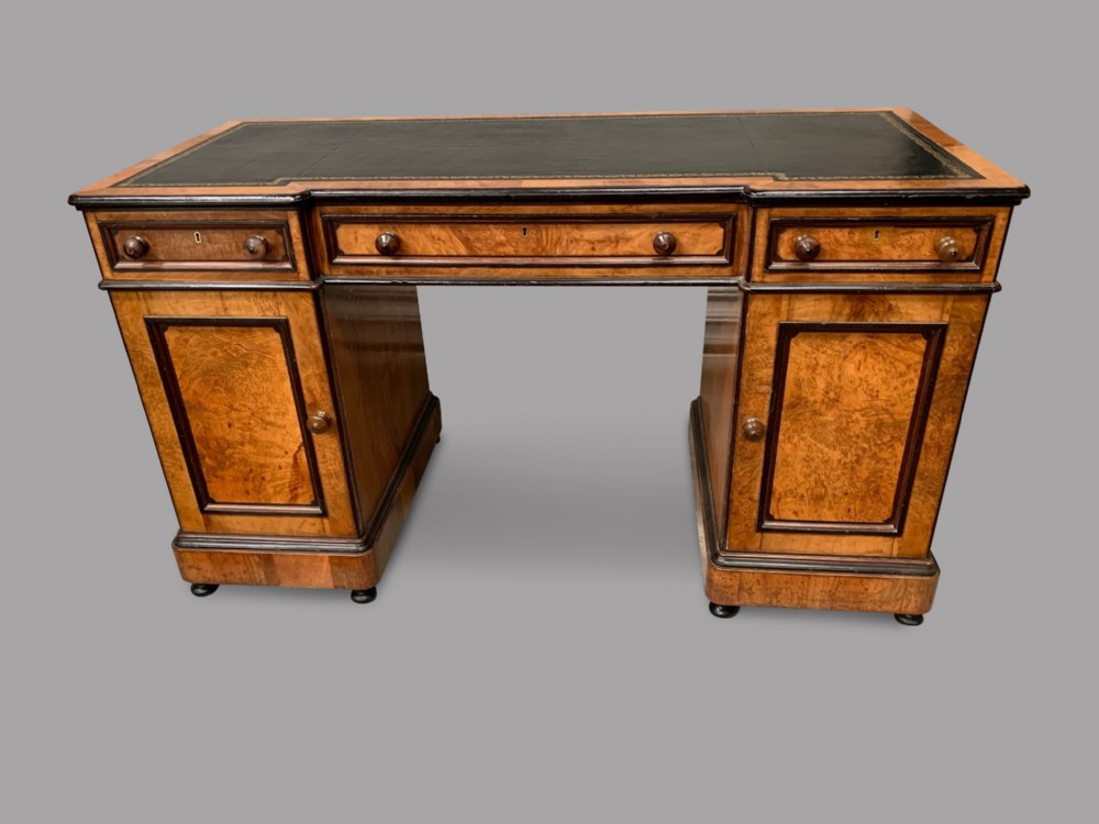 A Breakfront kneehole desk by Lamb of Manchester 