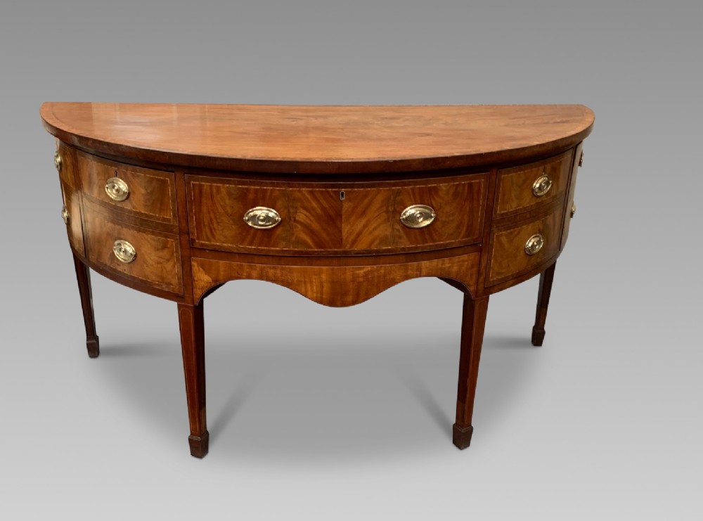 A Large Impressive Bow Fronted Georgian Sideboard