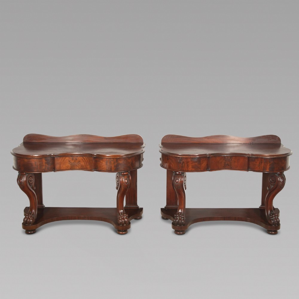  Pair of English 19th Century mahogany console tables
